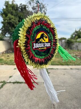 Round Jurassic Park Party Piñata - Green, Red, Yellow